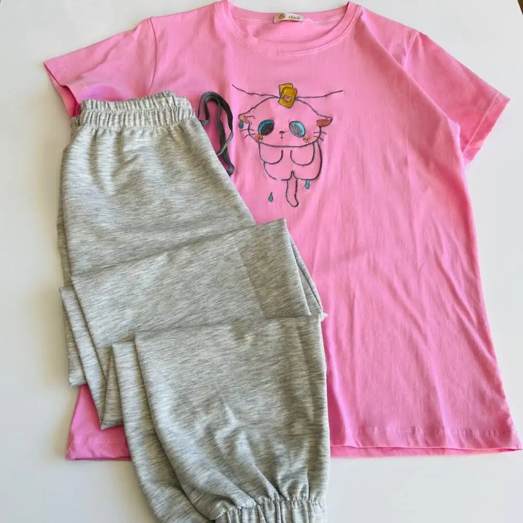 photo_2025-11-27_08-42-46_under100 ست تیشرت شلوار ملانژ کد 003 - تصویر 1